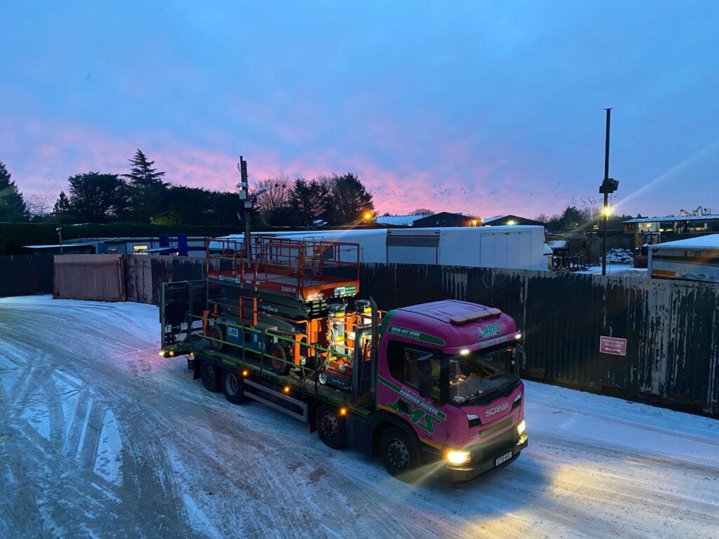 Truck-loaded-with-scissor-lift