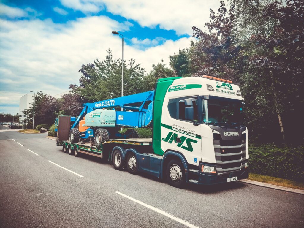 Cherry picker Genie Z135 on truck at Lutterworth