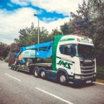 Cherry picker Genie Z135 on truck at Lutterworth