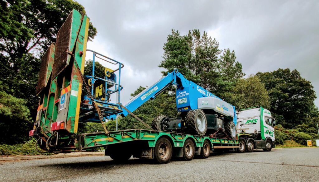 Genie ZX 1-35 boom lift on back of JMS truck for delivery