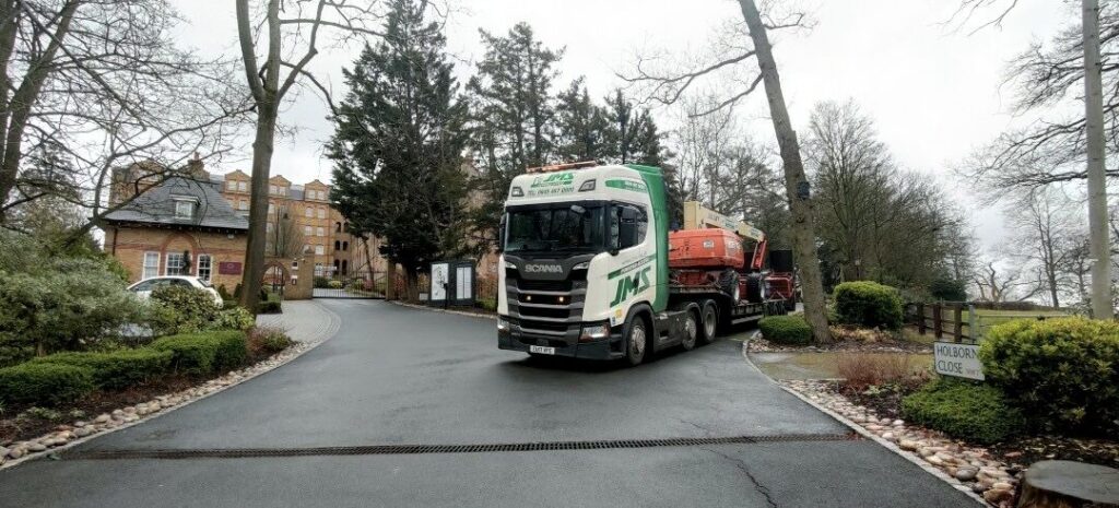 Collection of jlg boom at retirement home in north-west london